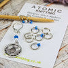 Atomic Knitting Notions and Stitch Markers