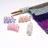 Atomic Knitting Notions and Stitch Markers